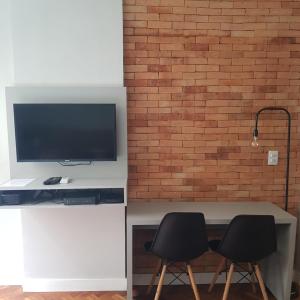 TV a/nebo společenská místnost v ubytování APARTAMENTO Studio 156, Copacabana, Rio de Janeiro