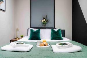 A bed or beds in a room at Forest Fields Studios Nottingham