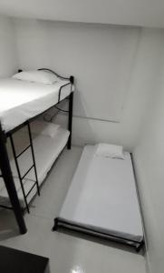 Postel nebo postele na pokoji v ubytování Apartamento de descanso Peñalisa Ricaurte