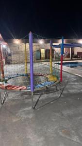 a hockey net with different colored poles on it at Recanto SB in Campo Limpo