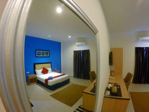 Ein Bett oder Betten in einem Zimmer der Unterkunft Royal Agate Beach Resort