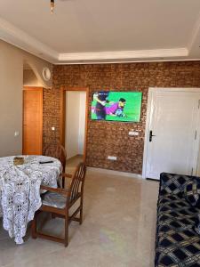 TV a/nebo společenská místnost v ubytování Casa azla playa