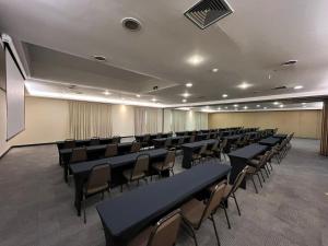 Οι επιχειρηματικές εγκαταστάσεις ή/και οι αίθουσες συνεδριάσεων στο Flat Moderno Hotel Slaviero GRU até 4p | Delfhy +41 φωτογραφίες