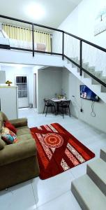 Et opholdsområde på Loft Pôr do Sol