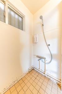 Koupelna v ubytování 栄町 ロータリービル + 37 fotografií