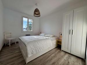 Postel nebo postele na pokoji v ubytování Maison plain-pied 3 chambres proche plage Saint-Denis-d'Oléron - FR-1-246A-366