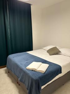 Postel nebo postele na pokoji v ubytování Ap Novo Moderno Itapua Vila Velha ES