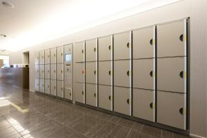a row of lockers in a locker room at Hakata Green Hotel Annex in Fukuoka