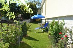 Jardín al aire libre en Don Camillo Gästehaus