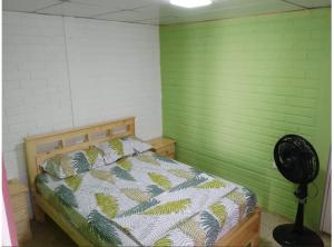 Postel nebo postele na pokoji v ubytování Kame House + 1 fotografie