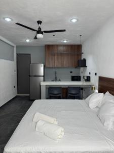 Postel nebo postele na pokoji v ubytování Apartamentos 31