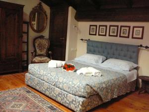 A bed or beds in a room at Agriturismo Ca' di Mazza Még 37 kép