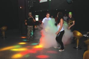 a group of people dancing on a dance floor with smoke at Side Alegria Hotel & Spa - All Inclusive-Adult Only in Side