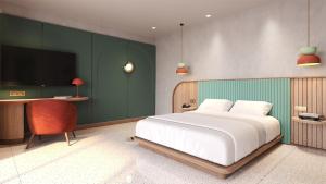 Kleo Seminyak, part of JdV by Hyatt客房内的一张或多张床位
