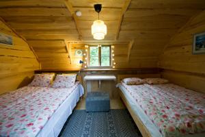 Postel nebo postele na pokoji v ubytování Käspri Farmstay