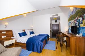 Postel nebo postele na pokoji v ubytování Palma Rooms B&B