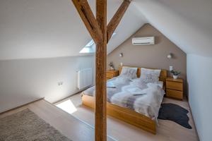 Posteľ alebo postele v izbe v ubytovaní Premium Buda Castle Apartment