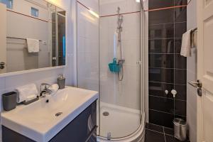 Kúpeľňa v ubytovaní Premium Buda Castle Apartment