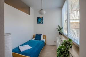 Posteľ alebo postele v izbe v ubytovaní Premium Buda Castle Apartment