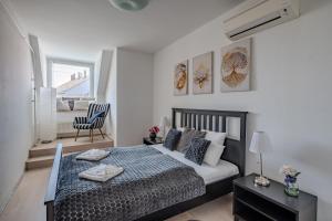 Posteľ alebo postele v izbe v ubytovaní Premium Buda Castle Apartment