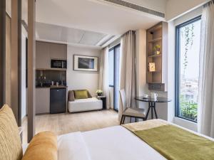 Fotografie z fotogalerie ubytování W Residence Living v destinaci Dháka + 46 fotografií