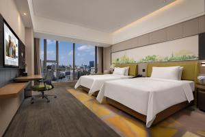 Μια τηλεόραση ή/και κέντρο ψυχαγωγίας στο Hampton by Hilton Shanghai Jiuting