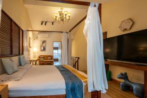 Cama o camas de una habitación en 枕窗听雨Homestay