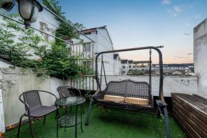Balkón nebo terasa v ubytování 枕窗听雨Homestay