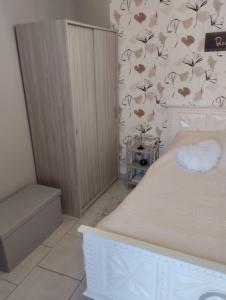 Postel nebo postele na pokoji v ubytování Chambre du Hamel