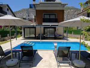The swimming pool at or close to Villa KayaHan Göcek