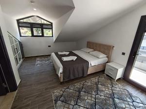 A bed or beds in a room at Villa KayaHan Göcek