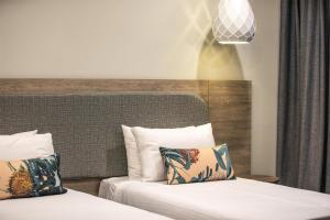 Nightcap at Sandbelt Hotel客房内的一张或多张床位