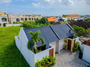 an aerial view of a house with a roof at Katamaya Villa in Mantaak