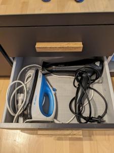 a drawer with a hair dryer in it at Apartment in Ludwigsburg in Ludwigsburg