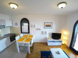 Kuchyň nebo kuchyňský kout v ubytování Apartments Villa Mirella