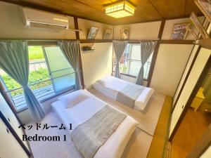 Voodi või voodid majutusasutuse #池袋駅無料送迎サービス #上野14分丨日暮里10分丨一棟貸切丨最大7名# Ikebukuro Free Pickup#Ueno 14 mins 丨Nippori 10 mins 丨Entire property丨Up to 7 guests 丨B toas