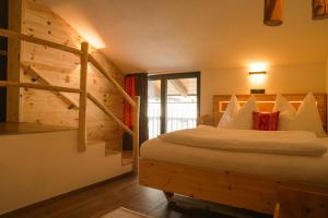 Postel nebo postele na pokoji v ubytování Apartments Wiglhof