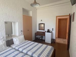 Pythaïs Hotel客房内的一张或多张床位
