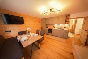Kuchyň nebo kuchyňský kout v ubytování Apartments Wiglhof