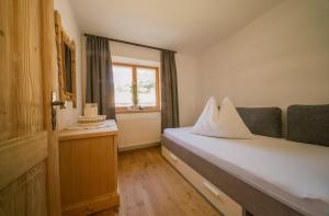 Postel nebo postele na pokoji v ubytování Apartments Wiglhof