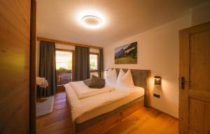 Postel nebo postele na pokoji v ubytování Apartments Wiglhof