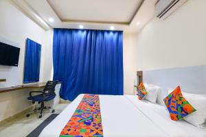 Postel nebo postele na pokoji v ubytování FabHotel Skylight Inn - Artemis Hospital Gurgaon