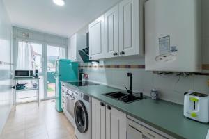 Η κουζίνα ή μικρή κουζίνα στο Surf House Gama