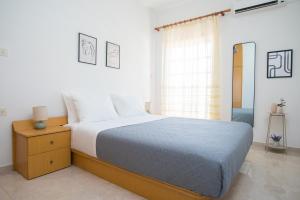 Ένα ή περισσότερα κρεβάτια σε δωμάτιο στο Medusa Sea Residence