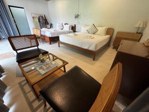 Cosy Garden Khao Sok客房内的一张或多张床位