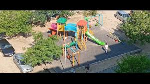 an overhead view of a playground with a slide at Galina Apartment in Kŭrdzhali
