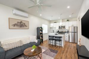 a living room with a couch and a table at Modern home near Downtown San Diego in San Diego
