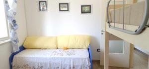 Postel nebo postele na pokoji v ubytování Lungomare - Casa Vacanze
