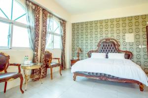 Lova arba lovos apgyvendinimo įstaigoje Ding Shian B&B