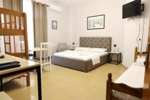 Posteľ alebo postele v izbe v ubytovaní Central Hostel